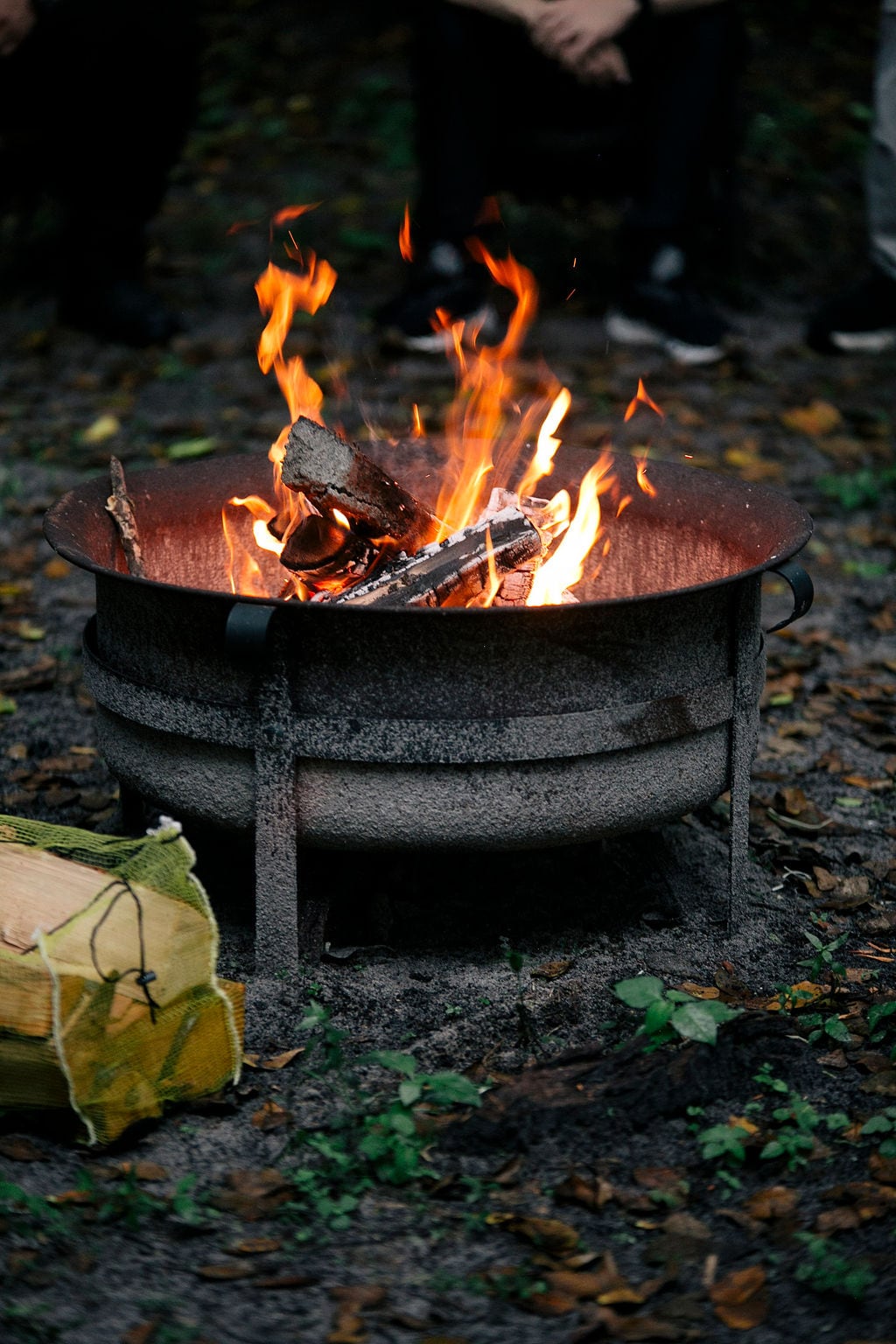 A fire burning during an outdoor Ahdama gathering